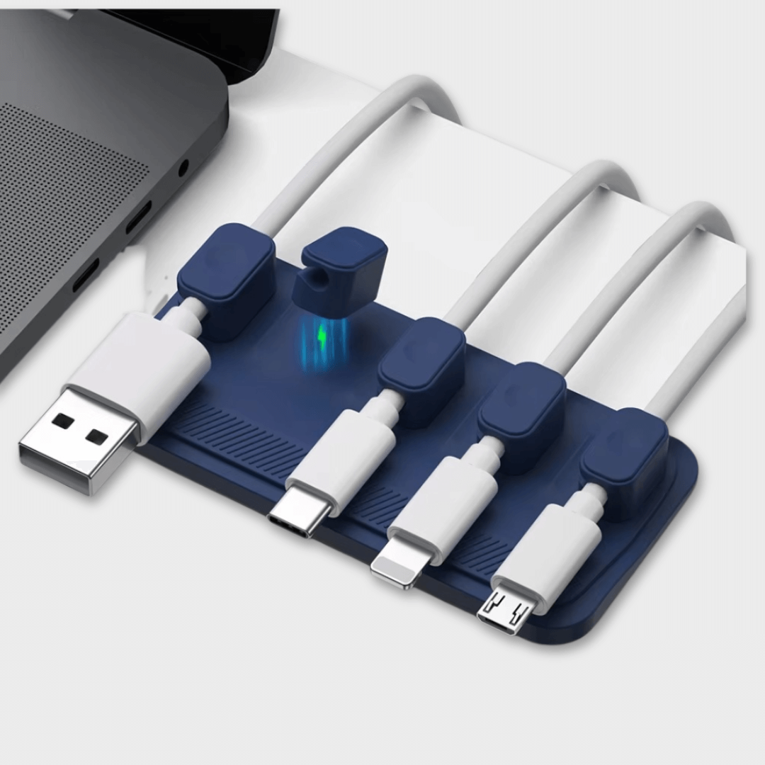 Magnetic cable holder on desk